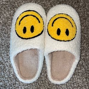 Smiley face slippers, never worn
